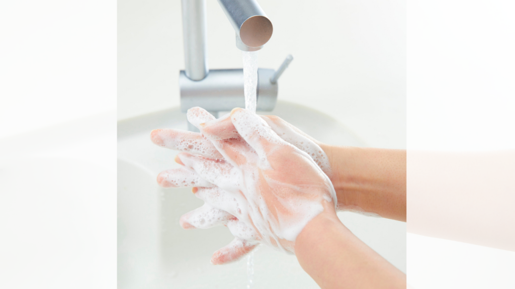 handwashing with soap in sink