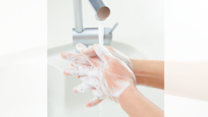 handwashing with soap in sink