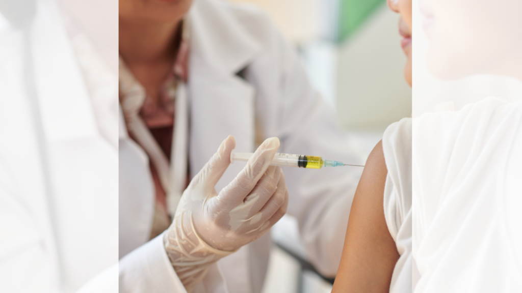 doctor giving patient vaccine shot