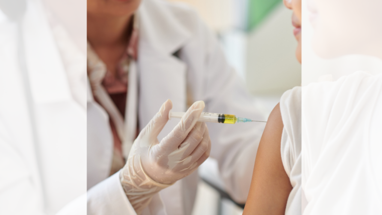 doctor giving patient vaccine shot
